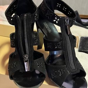 Michael Kors . Berkeley zip front high heel sanders.